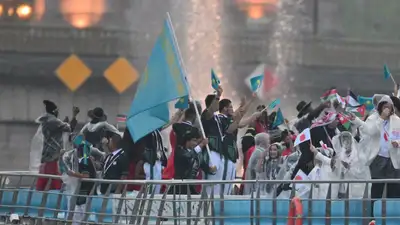 Сборная Казахстана приняла участие в официальной церемонии открытия Олимпиады-2024