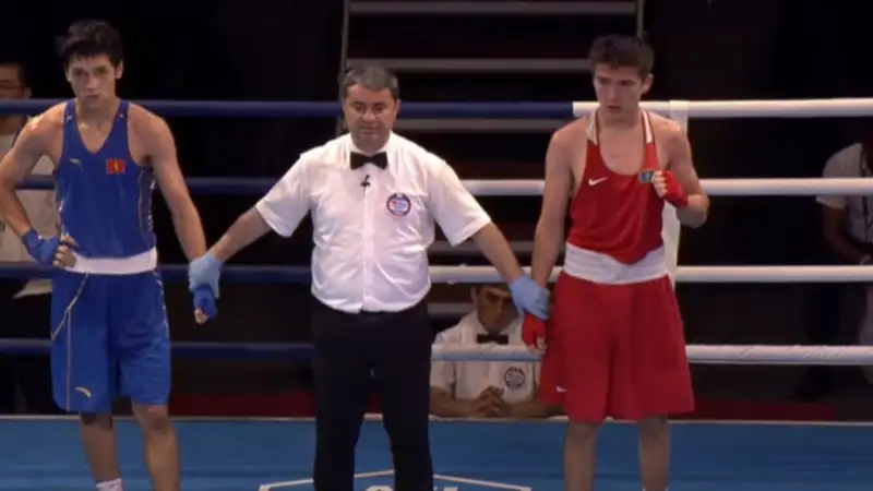 Двумя нокдаунами и судейским разгромом завершился финал Казахстан - Кыргызстан на чемпионате Азии по боксу