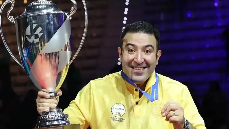 Саим Паккан с кубом Лиги чемпионов EКВ